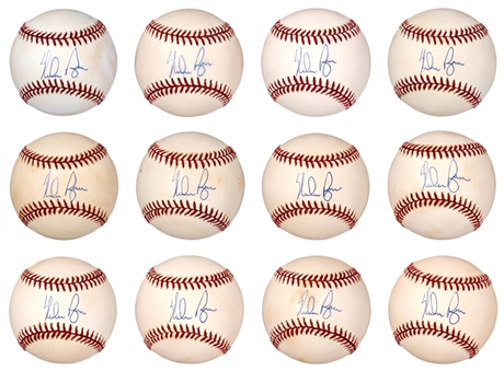 Lot of (12) Nolan Ryan Single Signed OAL Brown Baseballs (JSA)